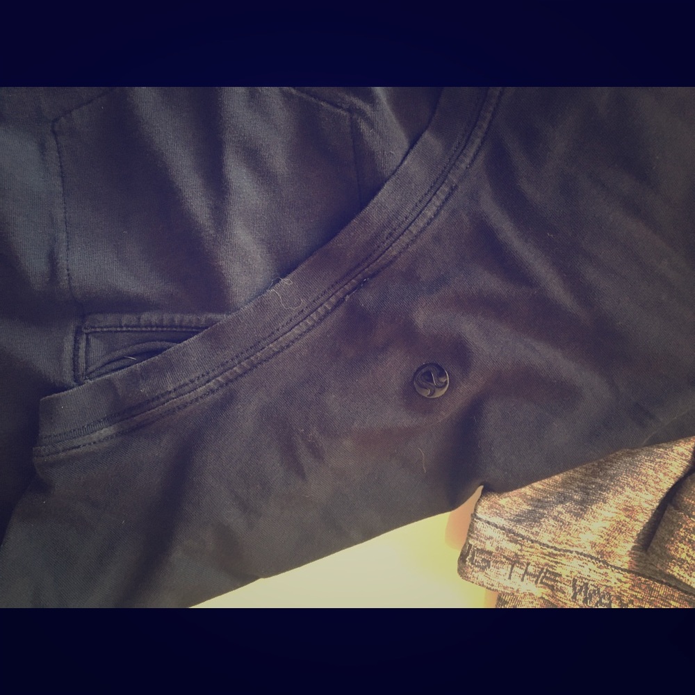 2 Men’s Large long sleeved Lululemon shirts.